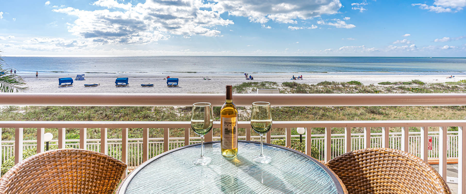 Share a glass of wine on  the balcony at Chateaux 109.