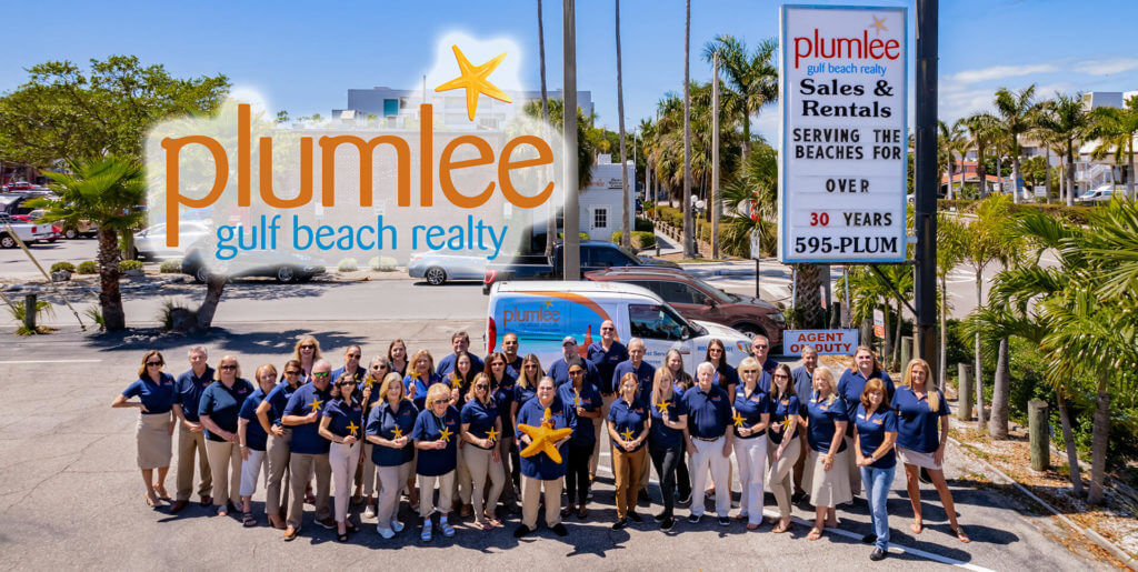 Photo of Plumlee Gulf Beach Realty team outside: a fantastic choice to book direct and save on your Florida vacation