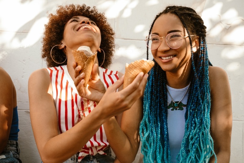 Two people smiling and enjoying ice cream in Indian Rocks Beach