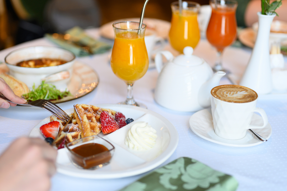 People eating brunch food at a restaurants in Tampa Bay Area