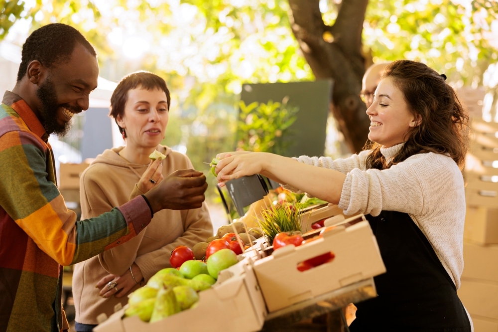 People buying produce at Tampa Bay beaches farmers markets