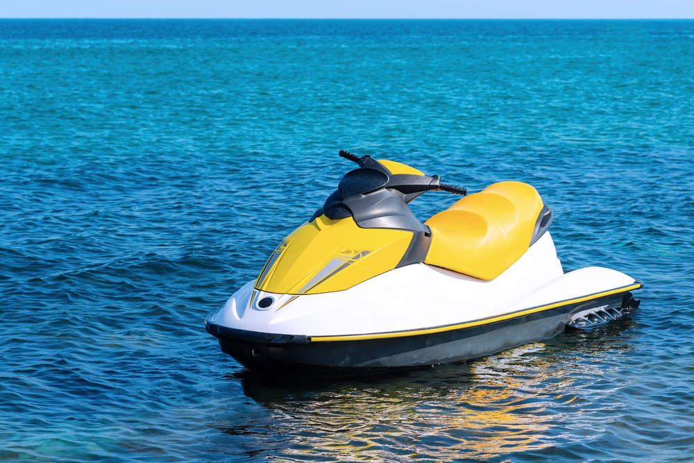 yellow jet ski rental in the water at Indian Rocks Beach