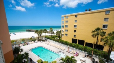 View from of the pool and beach from the balcony of Beach Palms Condominiums |Plumlee Gulf Beach Vacation Rentals