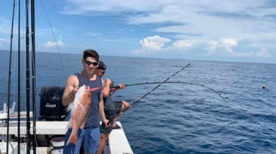 Teenage boys fishing on the Gulf of Mexico | Plumlee Indian Rocks Beach Vacation Rentals