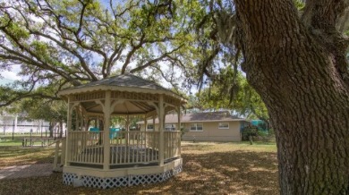 Gazebo in Park-Like Setting of Four Winds Villas in Downtown Indian Rocks Beach | Plumlee Vacation Rentals
