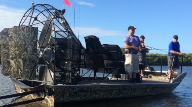 Men fishing off an airboat in West Central Florida | Plumlee Indian Rocks Beach Vacation Rentals