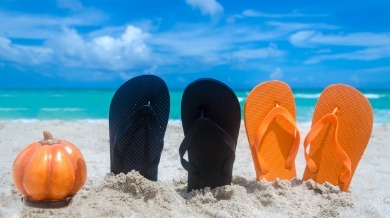 flip flops on beach | Plumlee Vacation Rentals