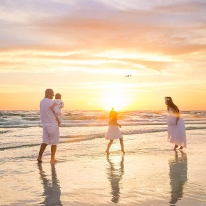 Family on the Beach Portrait | Plumlee Realty