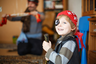 Kid dressed as a pirate