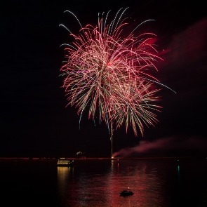 Fireworks over the water on Clearwater Beach, Florida | Plumlee Gulf Beach Vacation Rentals