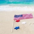 American Flag on Beach for Memorial Day | Plumlee Vacation Rentals