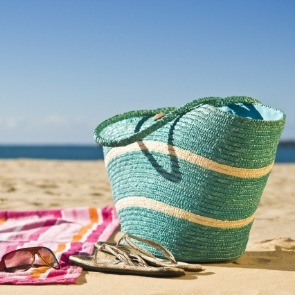 beach bag, towel, flip flops, sunglasses | Plumlee Gulf Beach Realty