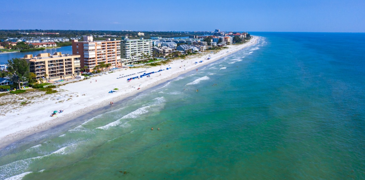 Aerial view of Indian Rocks Beach vacation rentals on the Gulf of Mexico beachfront | Plumlee Indian Rocks Beach Rentals Florida Gulf Coast