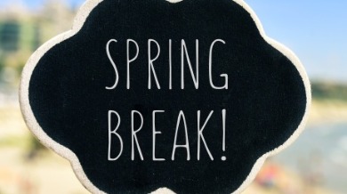 spring break sign on beach | Plumlee Vacation Rentals