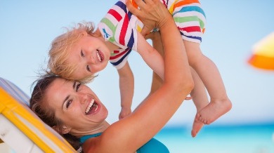 mother and daughter on beach | Plumlee Vacation Rentals