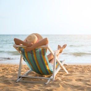 resting on the beach | Plumlee Vacation Rentals