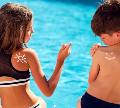 Kids at pool with sunscreen on | Plumlee Indian Rocks Beach rentals