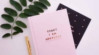 gratitude journal and pen | Plumlee Vacation Rentals