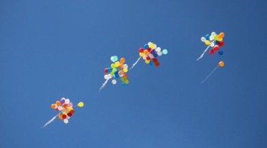 let go balloons in sky | Plumlee Vacation Rentals