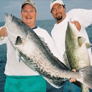 Two men who caught 2 big fish during Simply Hooked Fishing Charter excursion 