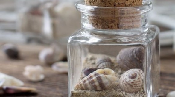 Simple Square Jar Filled with Sand and Shells | Plumlee Indian Rocks Beach Vacation Rentals